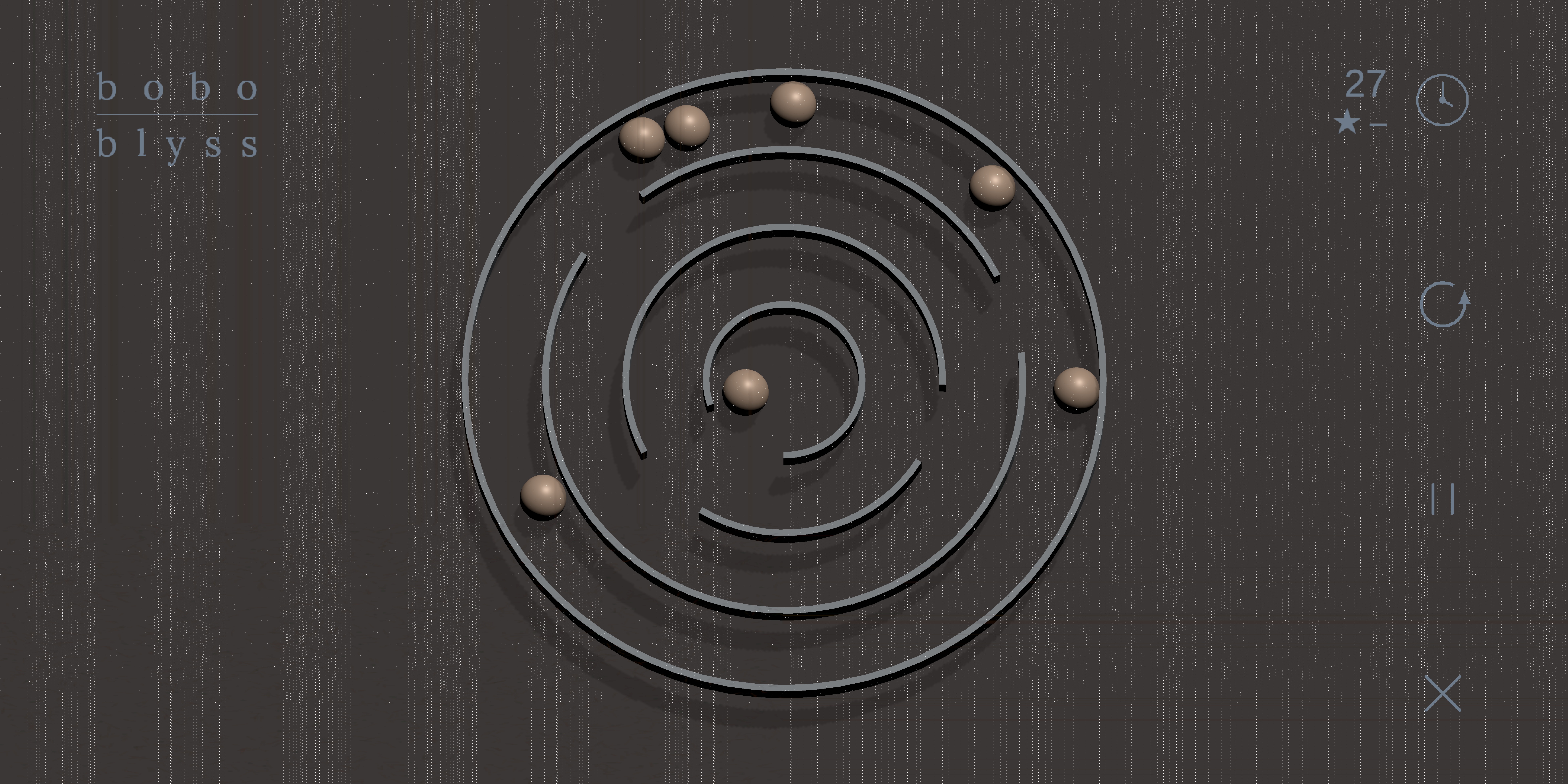 A boboblyss game screen consisting of a 3-ringed circular maze and three balls